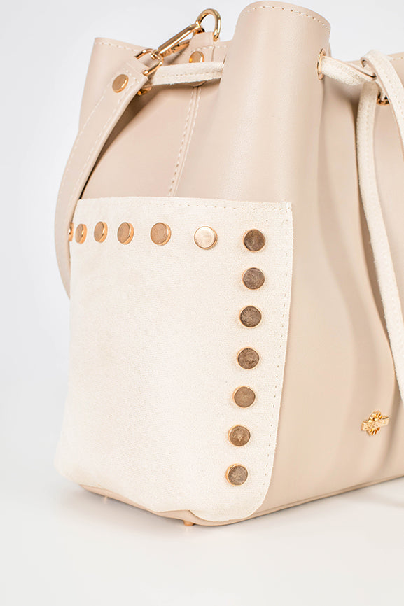 Close-up of the white bag with golden details