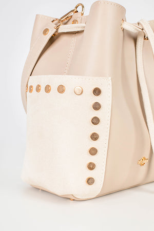 Close-up of the white bag with golden details