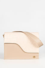 A beige bag from the front.