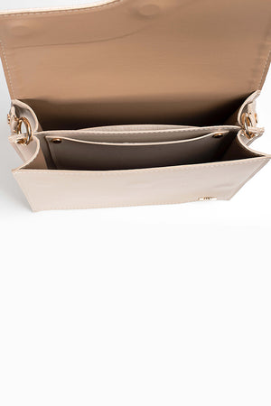 A beige bag viewed from above while it's open.