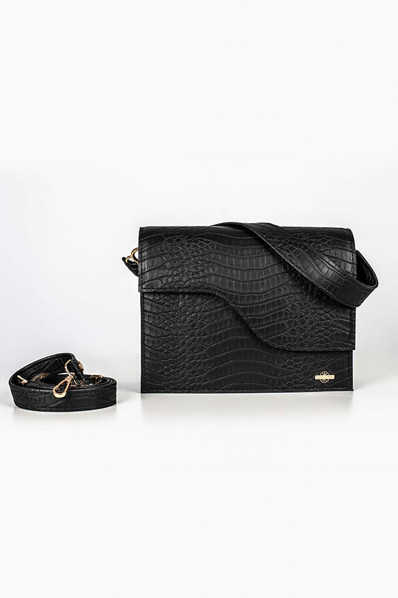 A black bag from the front side with a detachable strap on the left side.
