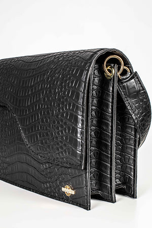 Close-up of a black bag on the side.